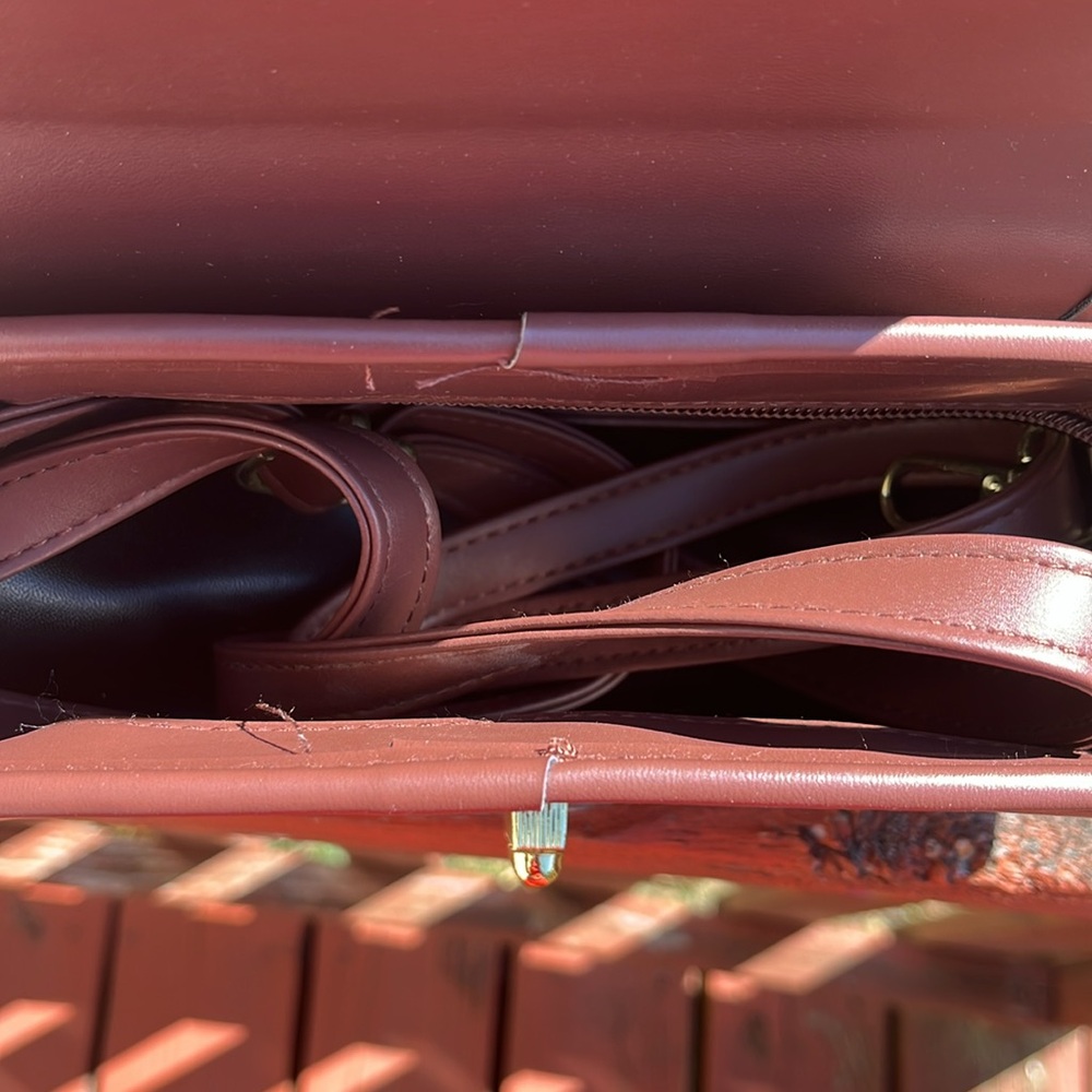 Burgundy Handbag with Gold Accents and crossbody strap. - Picture 2 of 3